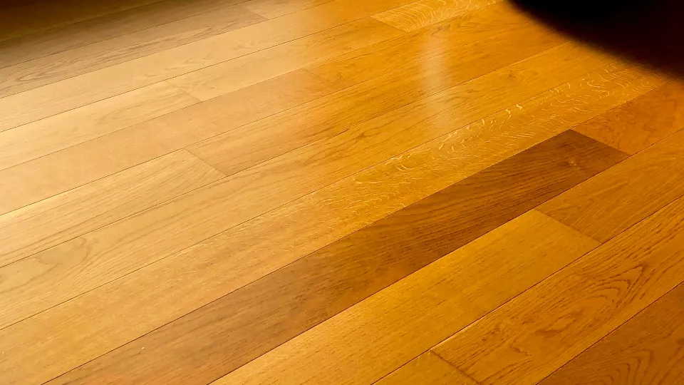 Comparison of LVT, engineered wood, laminate and solid hardwood flooring samples in a London home