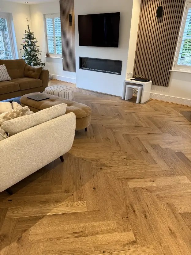 Finished luxury herringbone oak floor in a modern London living room after GT Floors installation