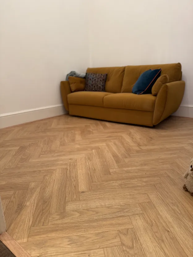 Precision herringbone wood floor fitting in London