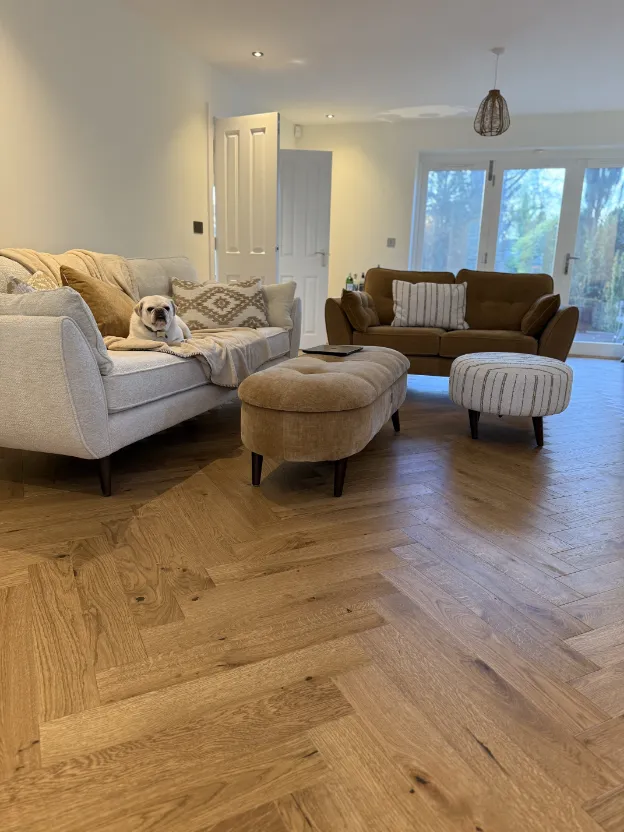 Restored and sanded herringbone parquet wood floor with Bona Traffic HD matt lacquer finish