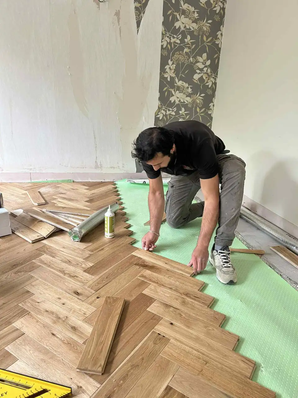 Kitchen and dining room waterproof herringbone LVT floor fitted by GT Floors in Romford RM1
