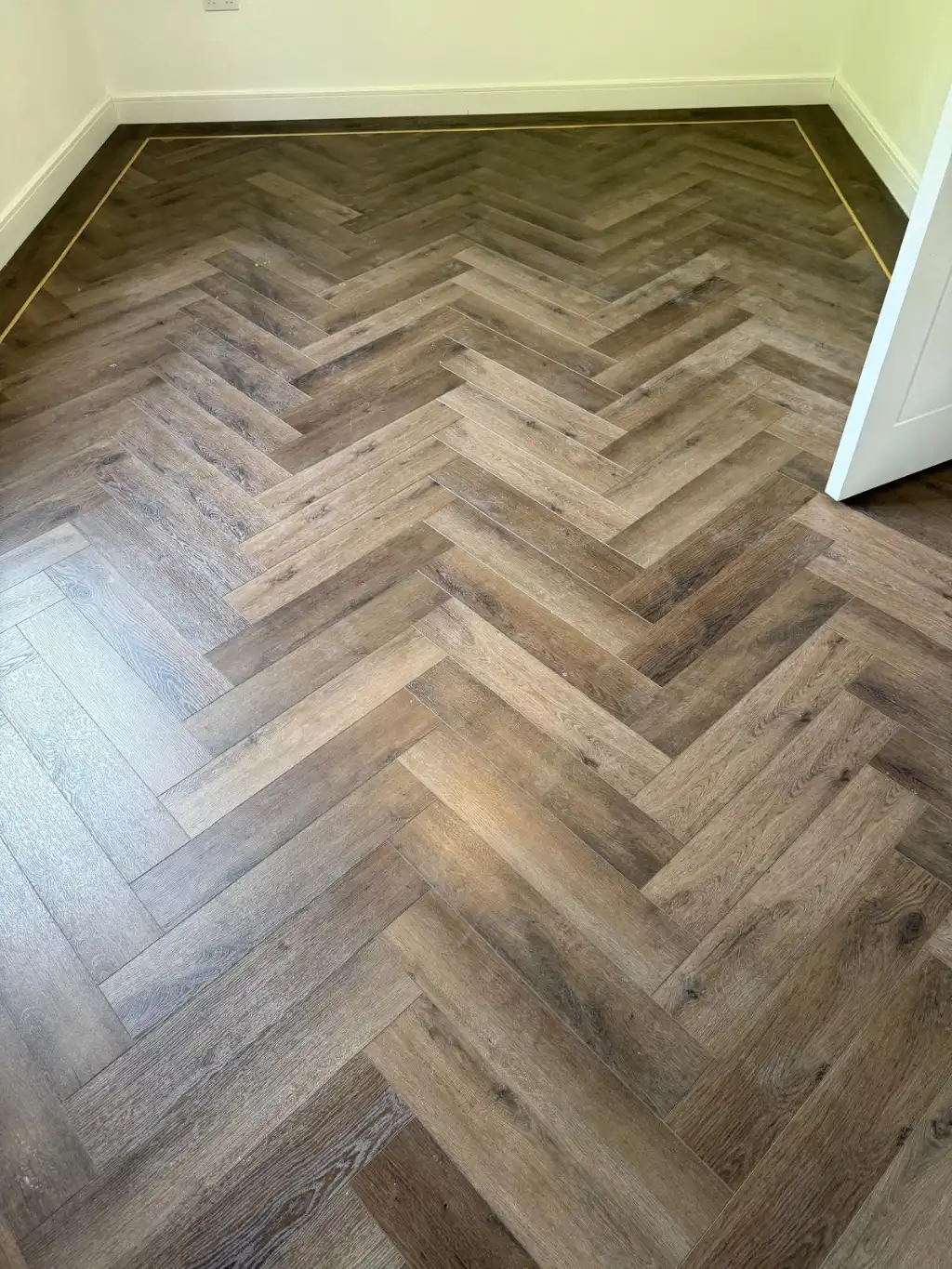 Solid oak parquet flooring with precision skirting board finish in Croydon CR0